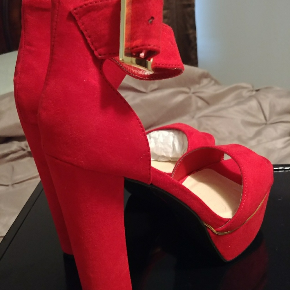 Quipid red high heeled pump